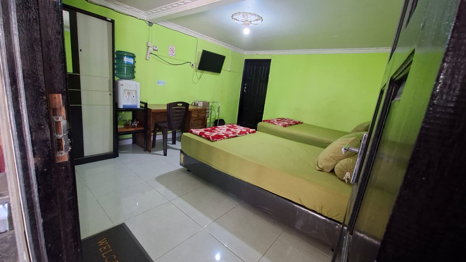 Kamar Penginapan D'Faviyo